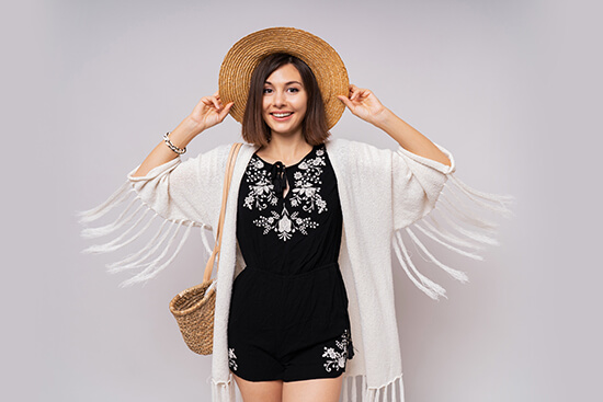 Woman wearing stylish casual clothing and hat
